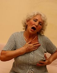This grandma loves playing with her wet pussy