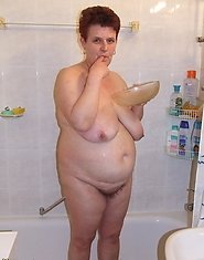 Big mature slut getting nasty in the shower